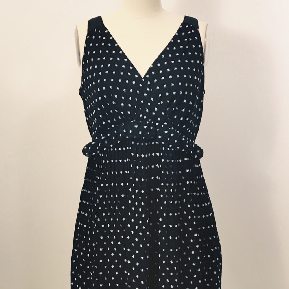 Pleated dot dress with frill detail